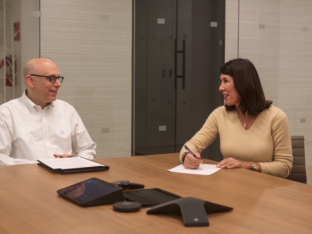 Point Winward advisors at a meeting